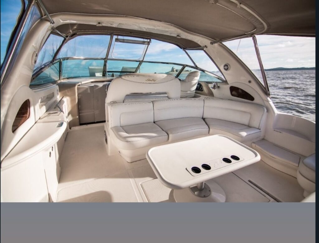 Outdoor living room with couch and table